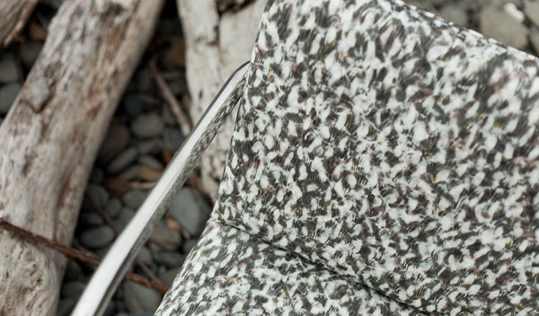 Carley Kahn "Scallop" upholstery fabric. Chrome chair upholstered in rose and gold colorway. 