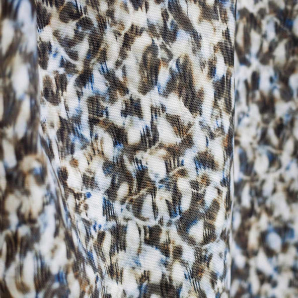 Carley Kahn "Scallop" upholstery fabric. Blue and tan colorway. 