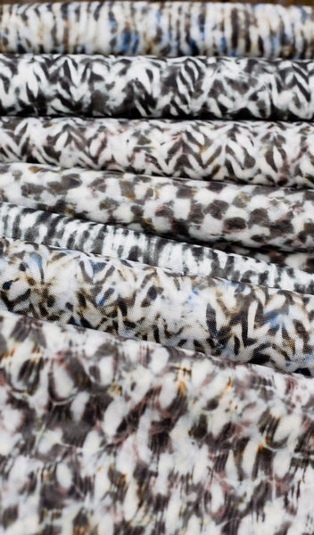 Carley Kahn upholstery fabric. All patterns and colorways side by side on bolts. 